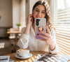 Wireless City heart-shaped stick-on mirror with rhinestone border for phone cases, Rose Gold finish.